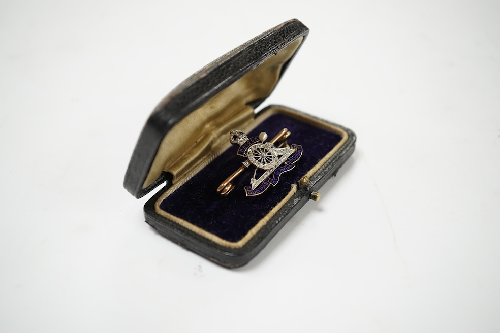 A cased early 20th century 9c, enamel and diamond set Royal Artillery sweethearts brooch, 37mm, gross weight 6.3 grams. Condition - good